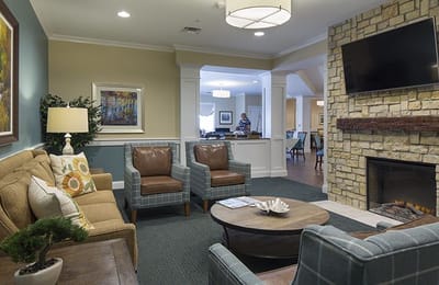 Cozy common area with comfortable seating and fireplace