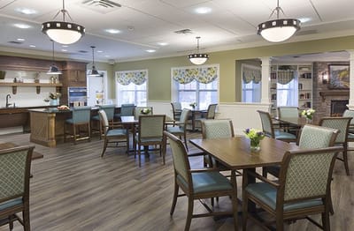 Bright dining area with tables and chairs