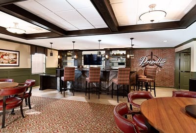 Bright and inviting common area with bar seating