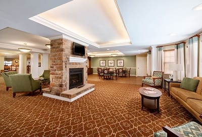 Cozy common area with seating and a fireplace