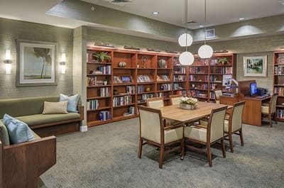 Interior common area with bookshelves and seating