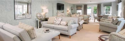 Bright common area with comfortable seating and decor