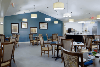 Bright dining room with tables and chairs