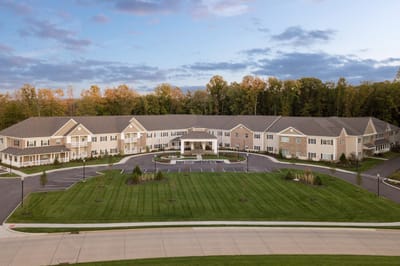 Aerial view of a senior living facility exterior and landscaping