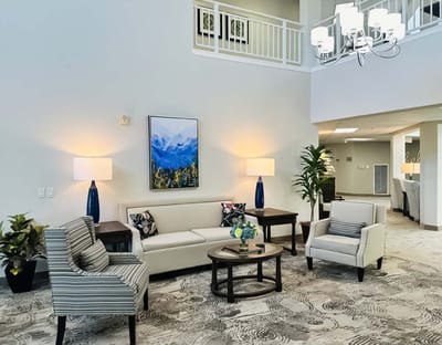 Common area lounge with comfortable seating and decorations