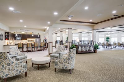Bright and spacious common area with seating and dining space