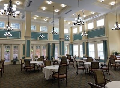 Bright dining room with tables and chairs