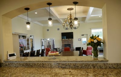 Interior common area with dining table and flowers