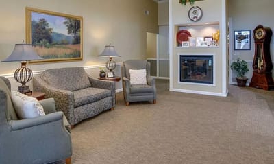 Cozy common area with seating and fireplace