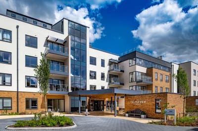 Exterior view of Castle View Retirement Village with architectural details