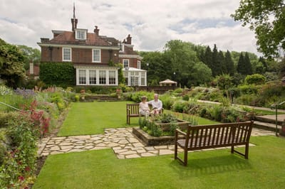 Residents enjoying a garden at Castle Village