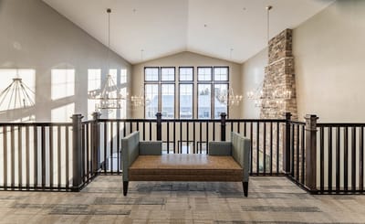 Bright interior space with seating and large windows