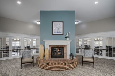 Bright and inviting common area with a fireplace