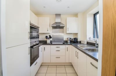 Bright kitchen area with modern appliances