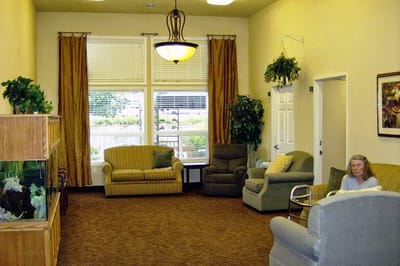 Cozy common area with seating and fish tank
