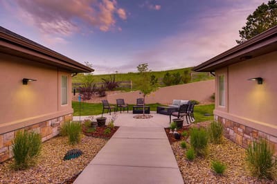 Outdoor garden area with seating and landscaping