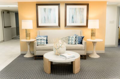 Cozy seating area with decorative tables and lamps