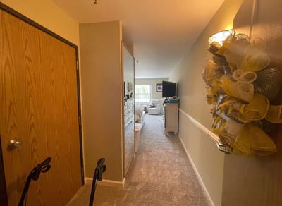 Hallway leading to a living area with decorations