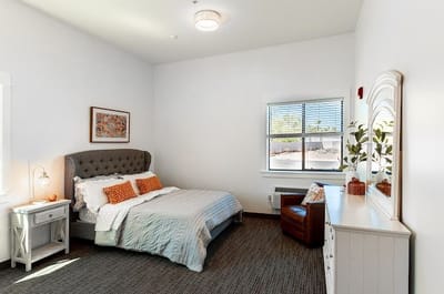 Cozy private bedroom in assisted living facility