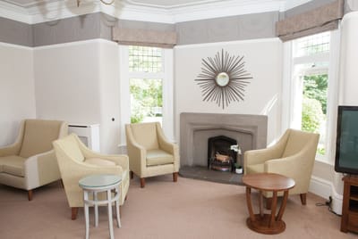 Bright, inviting lounge area with cozy seating