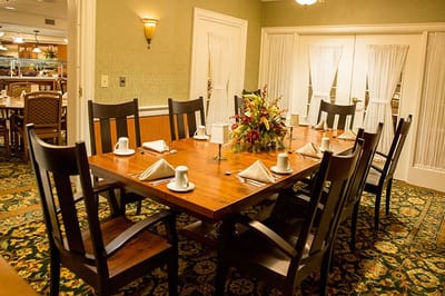 Interior dining room setup with table and chairs