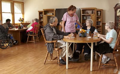 Residents and staff engaging in a common area