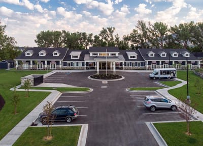 Aerial view of Covington Senior Living's building and parking area