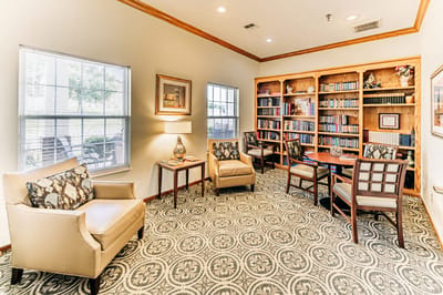 Cozy common area with reading materials and seating