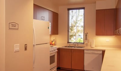 Bright kitchen area with modern appliances