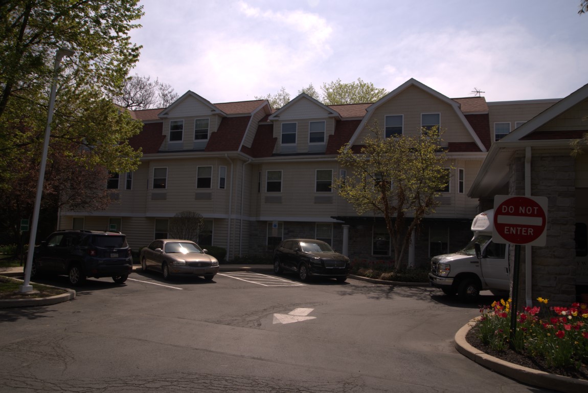 Exterior view of the facility with parking area