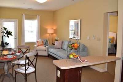 Cozy interior of a resident room with seating area