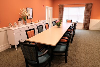 Interior view of a dining area with a long table