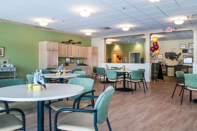 Dining area with tables and chairs in a common space