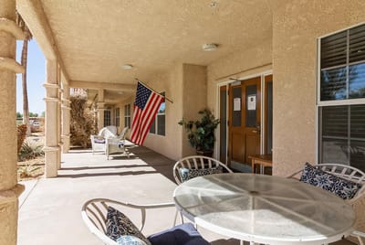 Outdoor seating area with an American flag