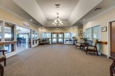 Bright common area with seating and natural light