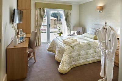 A bright and inviting resident room with a view