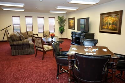 Comfortable common area with seating and a television