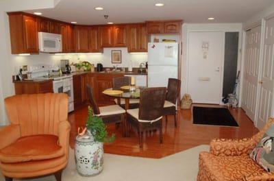 Bright and cozy kitchen area in a senior living unit