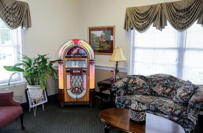 Cozy lounge area with a vintage jukebox and seating