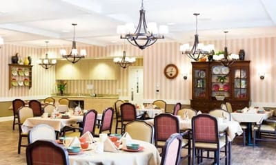 Dining room with tables set for meals