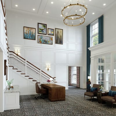 Bright interior lobby with seating and staircase