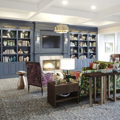 Interior common area with seating and bookshelves