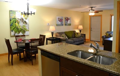 Cozy interior of a resident unit with dining area and living room