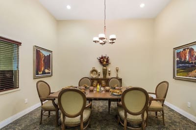 Dining area with table set for a meal