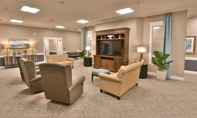 Common area with seating and a television