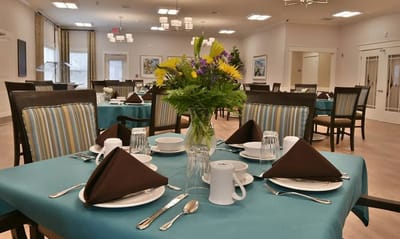Dining room set up with elegant table settings