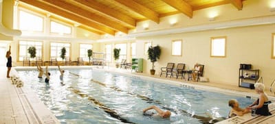Residents enjoying a swimming pool activity