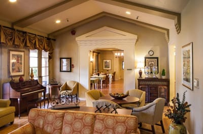 Cozy common area with seating and piano