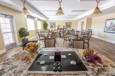 Interior view of a dining area with tables and chairs