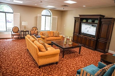 Cozy common area with seating and TV